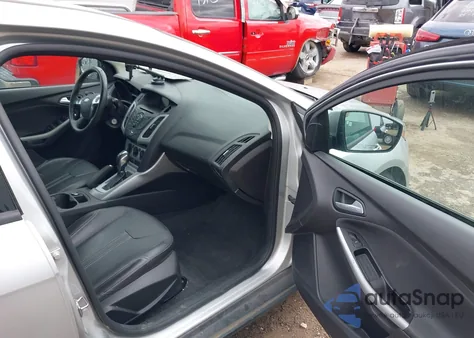 2014 Ford Focus Se z USA, uszkodzony, nr VIN 1FADP3F21EL320009